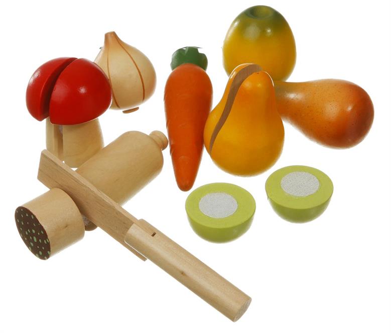Holzfrüchte, Pilze und Gemüse mit Messer